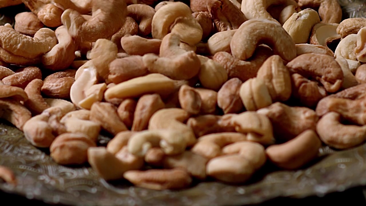 Fresh group, kernel nuts, Anacardium occidentale, slow motion scenery