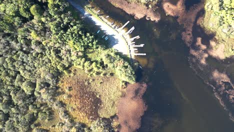 An-aerial-view-of-the-countryside-surroundings-and-lakes-in-Clonbur,-Galway-County,-Ireland