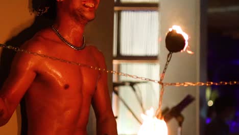 performer showcasing fire skills in krabi, thailand