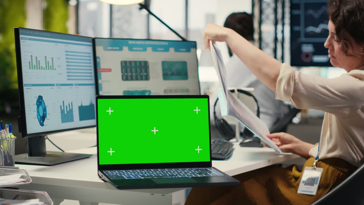Woman business analyst reviewing forecasts with a copy space
