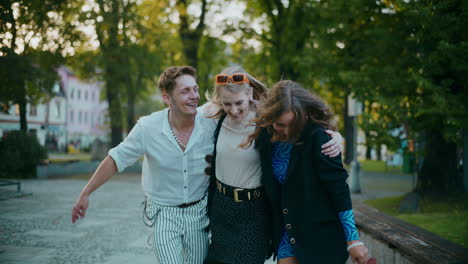 happy friends walking in the park