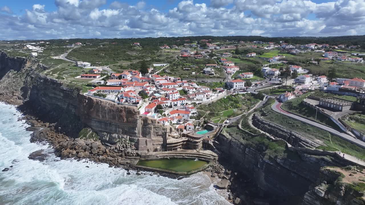 Azenhas Do Mar Beach At Sintra In Lisbon District Portugal. Beach Landscape. Tourism Landmark. Cityscape Scene. Azenhas Do Mar Beach At Sintra In Lisbon District Portugal.