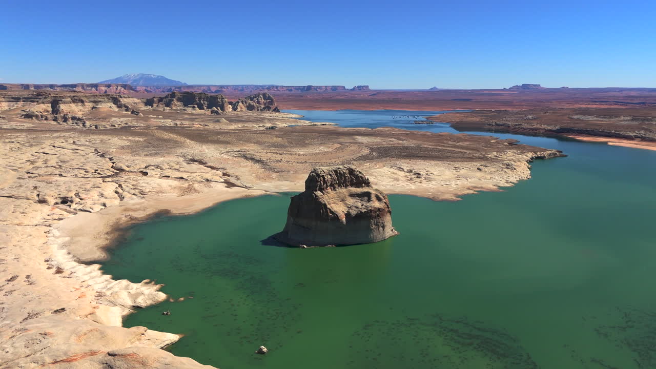 Lone Rock In Wahweap Bay With Tranquil Waters in Utah, USA. - aerial shot
