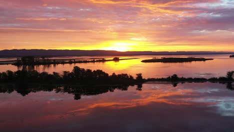 sunrise over a calm lake