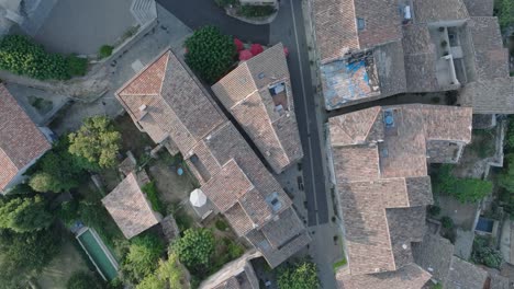 Aerial-Drone-Top-Down-Luberon-Provence-Saignon-France-Medieval-Town-at-Sunrise