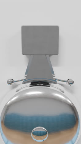 grey ringing bell on the wall of a school
