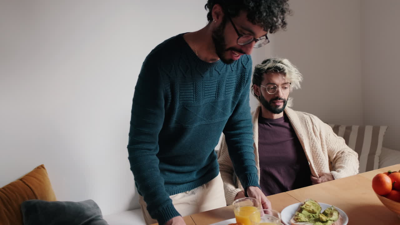 Gay Couple Having Breakfast at Home