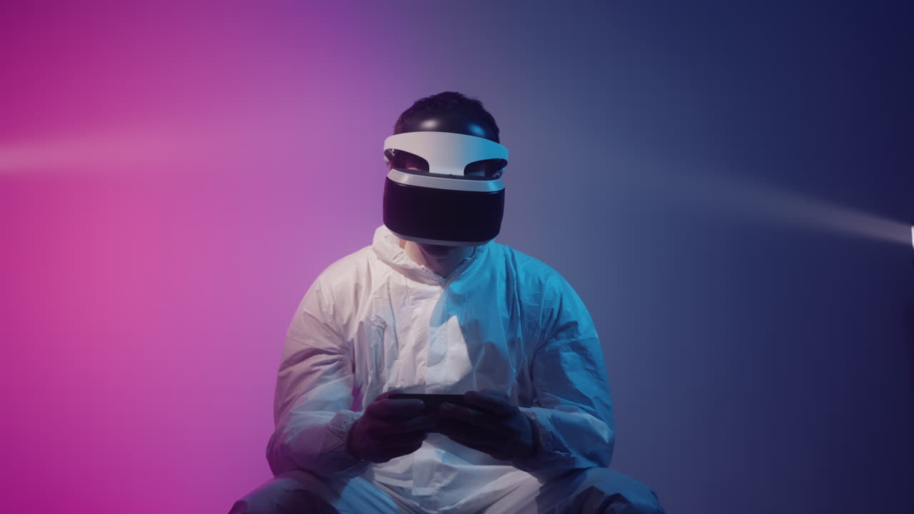 Person Wearing VR Headset and Smartphone