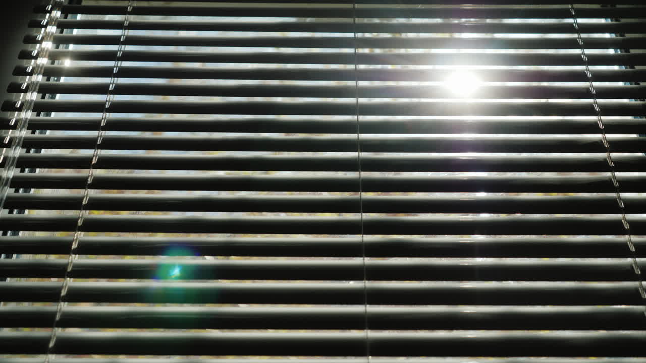 The Spring Sun Shines Through The Half-Closed Jalousie 4K Video