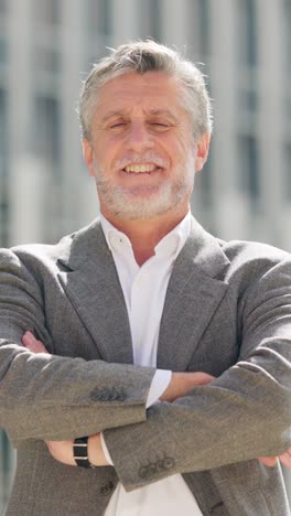 portrait of a confident senior businessman smiling