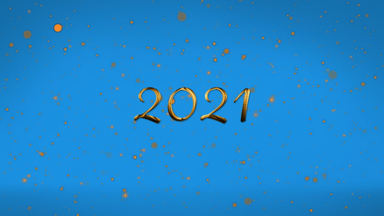animación del texto de 2021 sobre manchas doradas que caen sobre un fondo azul