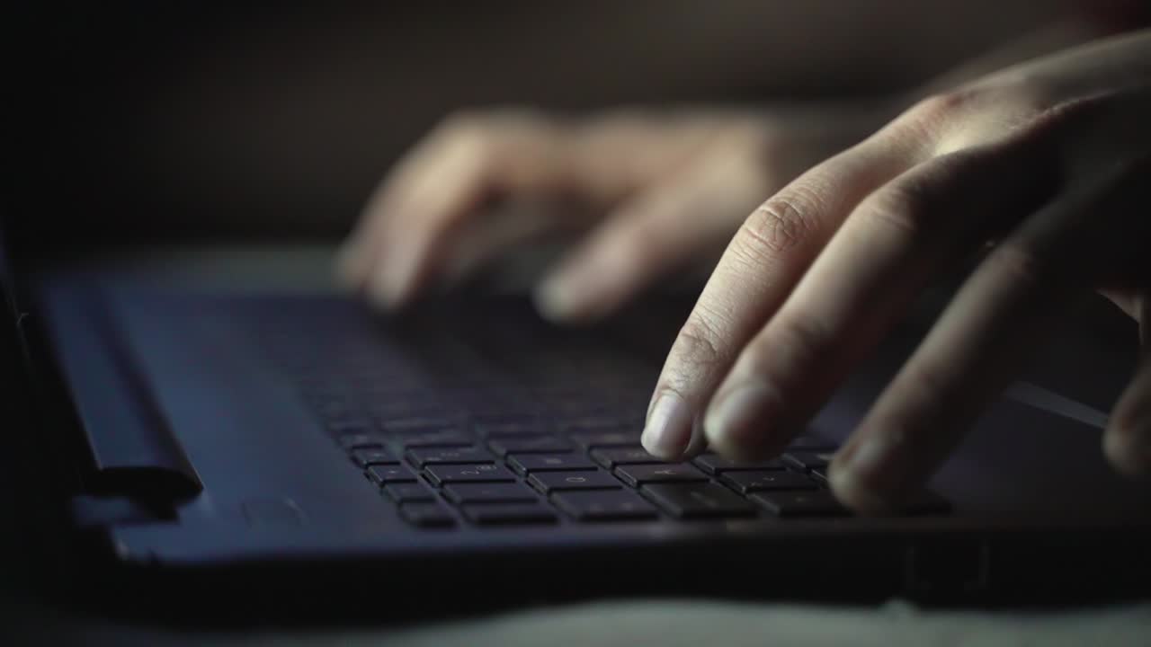 girl hands typing on a laptop keyboard searching on a search engine