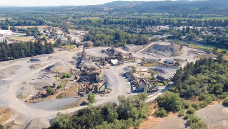 orbiting aerial view of a huge concrete quarry yard in healdsburg, california