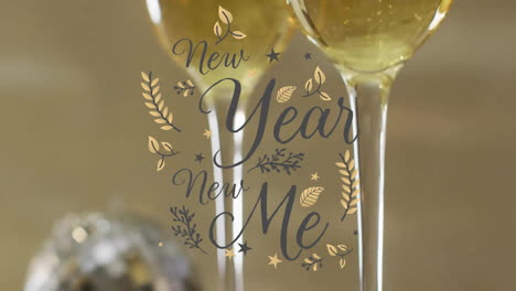 animation of new year new me text over champagne glasses