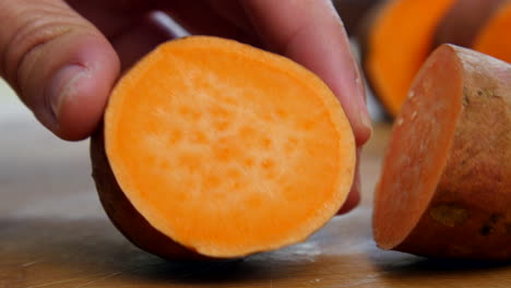 Cook-slices-open-sweet-potato