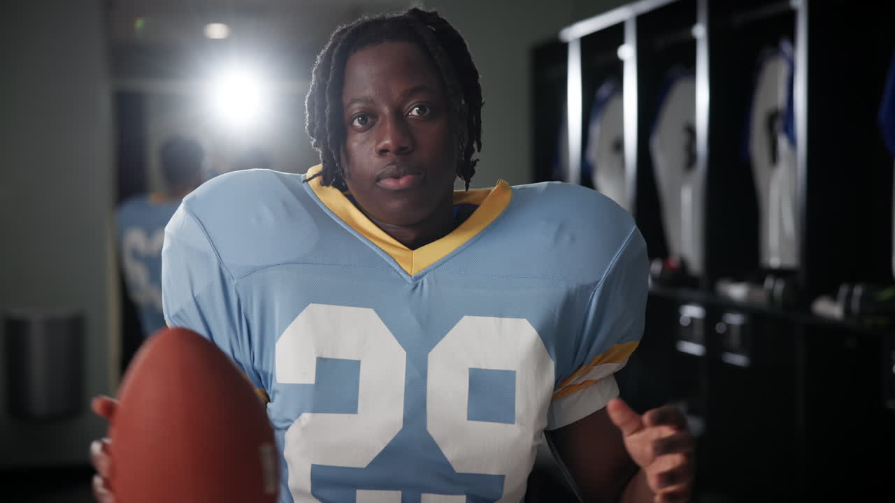 Football player in a locker room