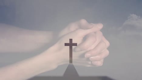 animation of caucasian woman praying over cross and clouds