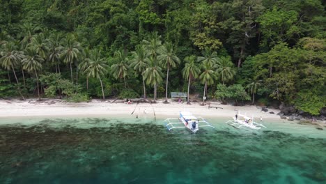 tropical scenery of pasandigan cove on cadlao island, el nido - philippines