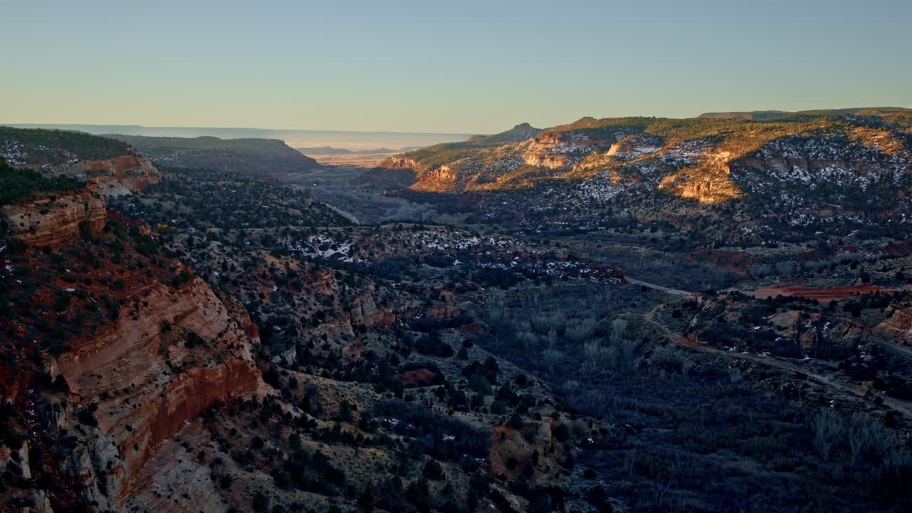 A cinematic aerial view of Arizona’s red-rock canyons near Page.