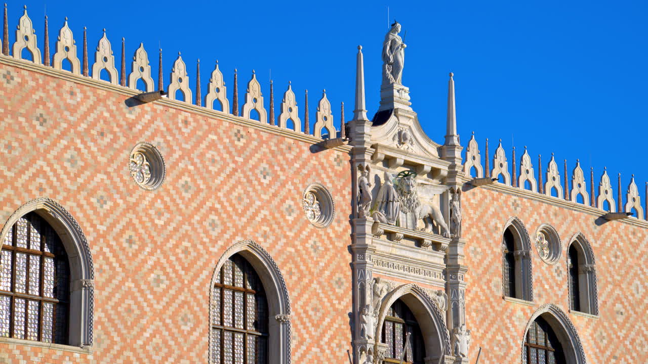 View of Doge's Palace in St. Mark's Square, near a harbour in Venice City, Italy
