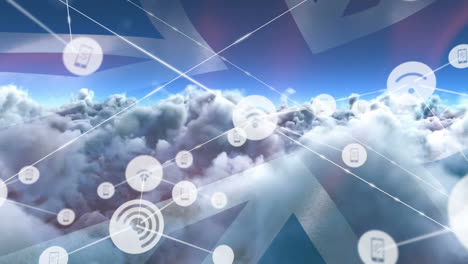 red de iconos digitales sobre la bandera del reino unido contra las nubes en el cielo
