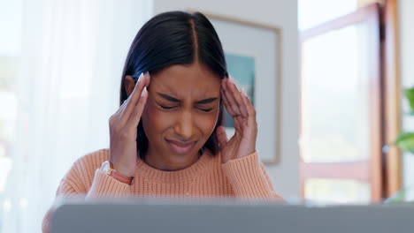 Woman,-headache-and-stress-on-laptop-studying