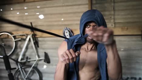 boxer practicing shadow boxing in the gym