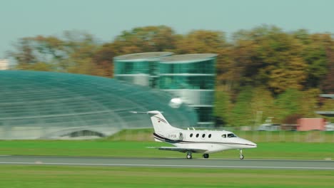 private jet beech 390 premier landing at scenic austrian airport salzburg located within the mountains