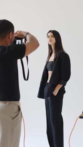 fashion photoshoot with a model in a black suit