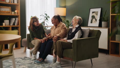 three senior women enjoying each other's company at home