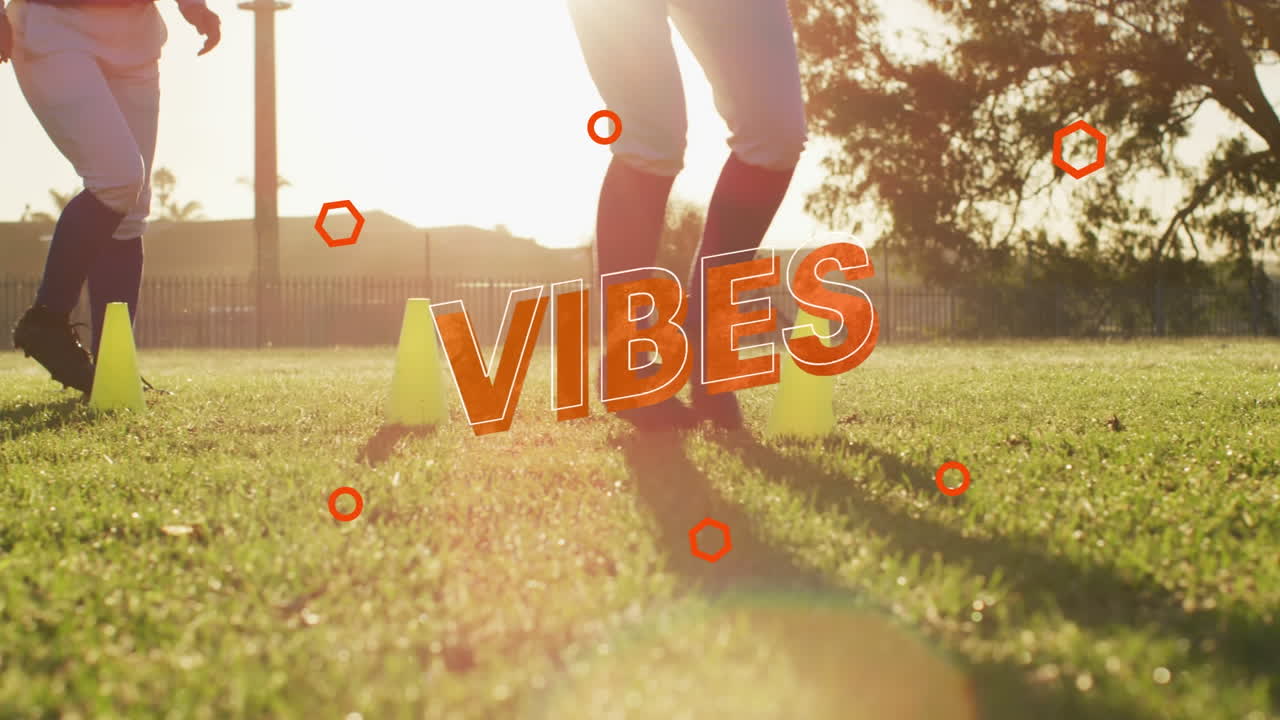 animación de vibraciones texto sobre jugadores de fútbol caucásicos ejercitándose