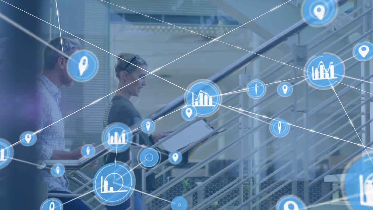 Animation of network of profile icons over caucasian man and woman discussing on stairs at office