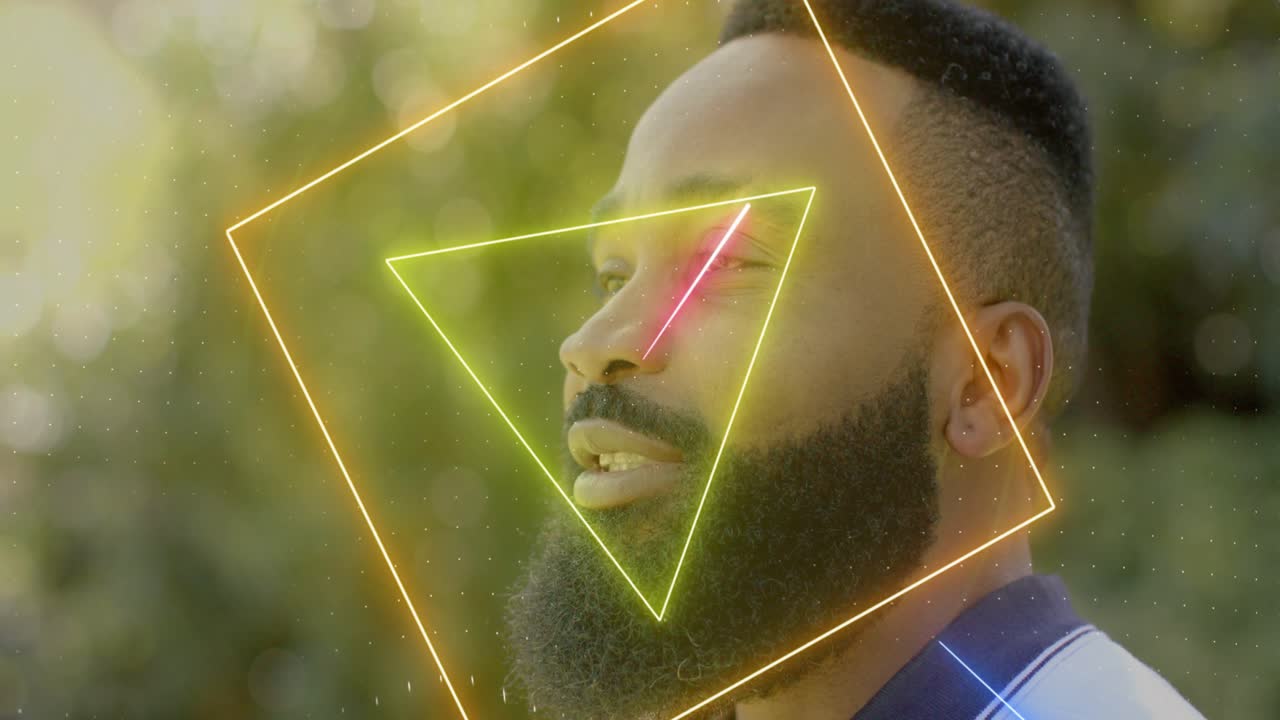 Mid-adult man responding to neon overlays animating over face, smiling, singing for music promotion