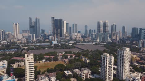 modern city high rise skyscraper buildings of new india. aerial drone view of the financial district of mumbai.