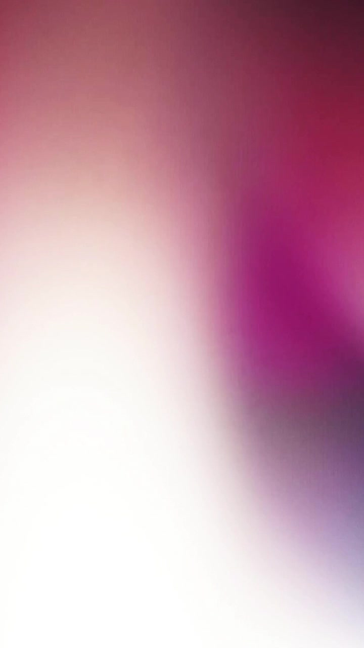 Abstract light leak transition with red and pink hues