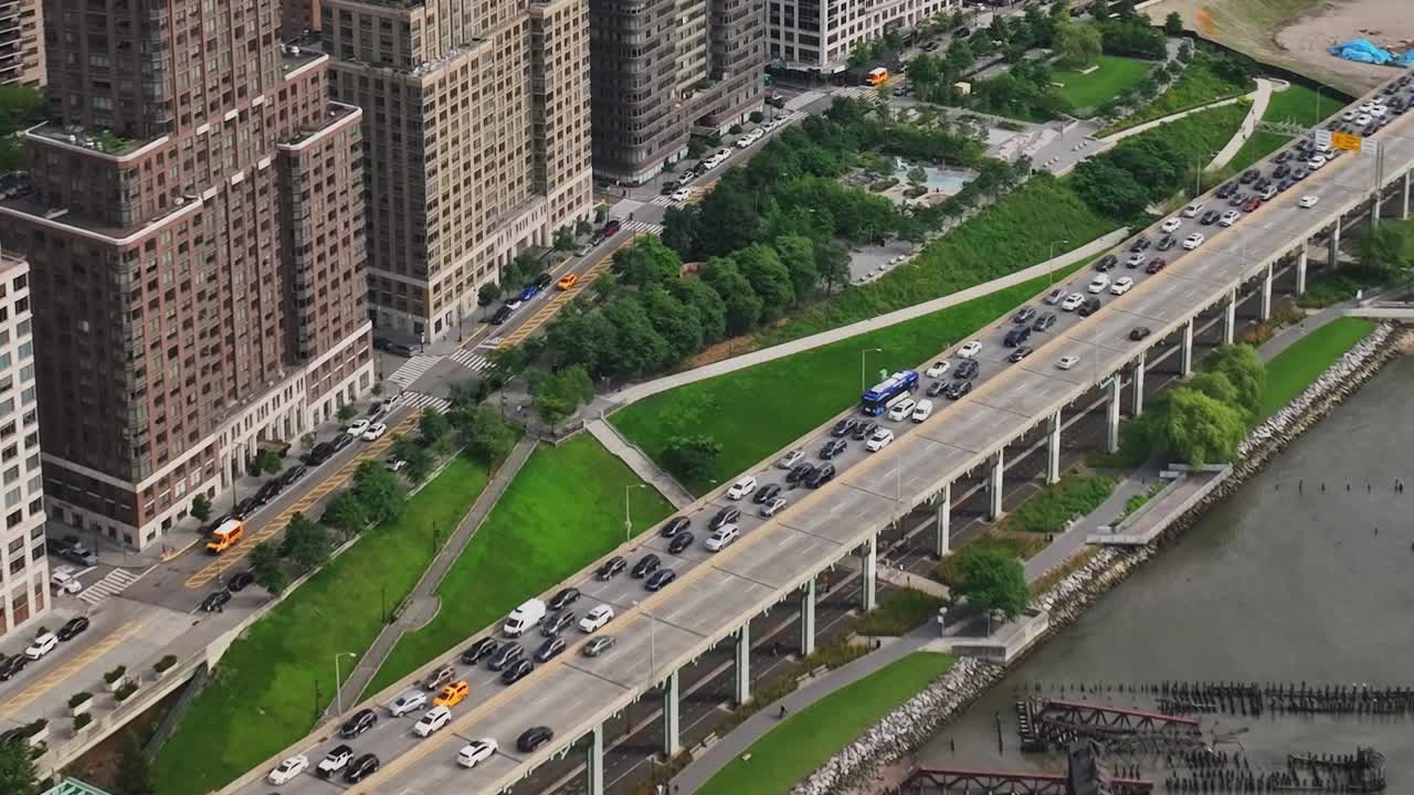 Aerial view of busy streets and green parks in New York City