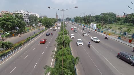busy roads of kolkata or calcutta, india, cars, buses and other vehicles at daytime