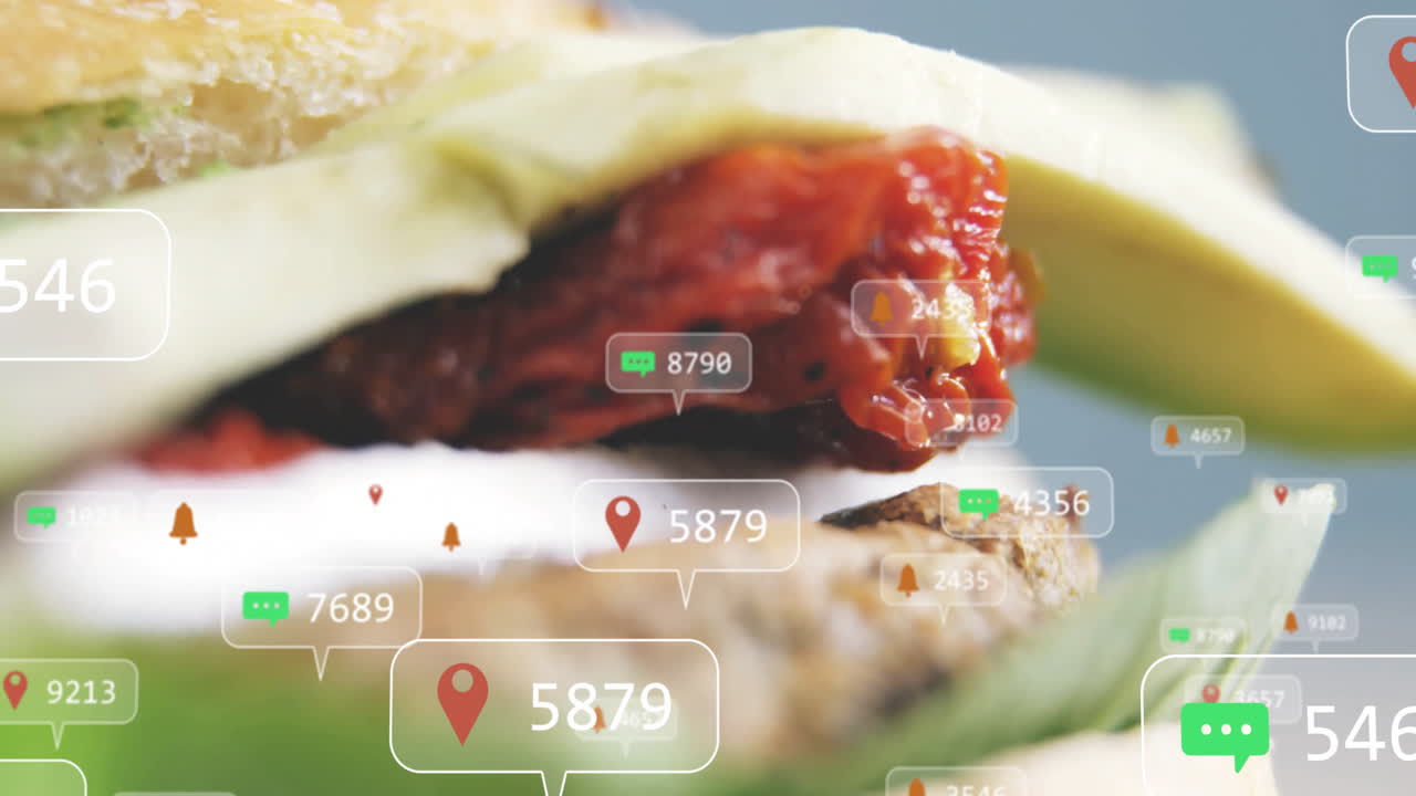 Overlay of social media notifications and location icons on sandwich close-up