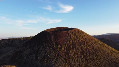 aerial drone view moving around the crater of a dormant volcano in st