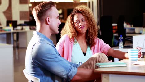 businessman interacting with coworker