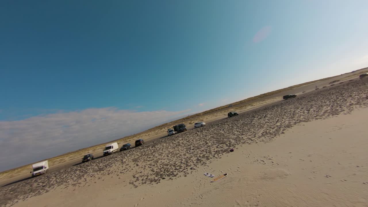 Masterful aerial shot of restless sea waves and the beautiful huge beaches of Domburg,Zeeland,