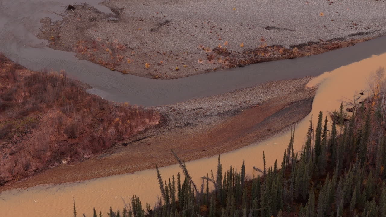 Creek Flowing Down The Ogilvie Mountains Along The Dempster Highway In Yukon, Canada. Aerial Shot