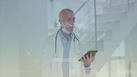 animation of data processing over caucasian male doctor with tablet