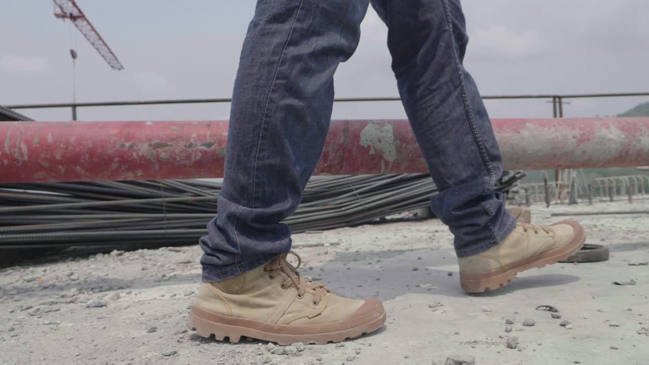 Construction Worker on a Bridge