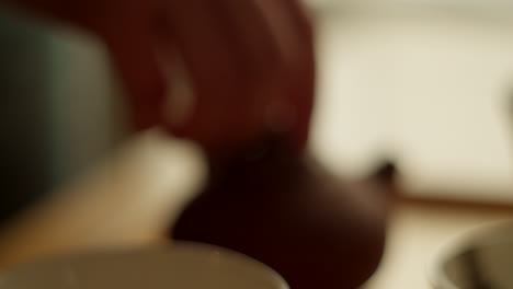 close-up of a brown clay teapot