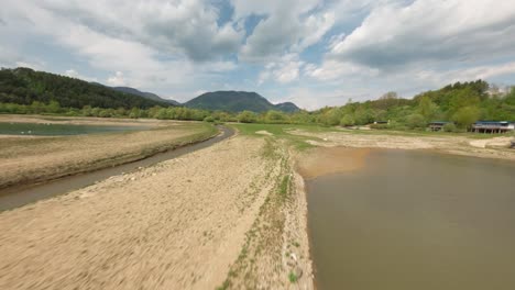 drone footage of a mountain basin lake facing water shortages