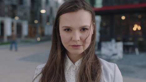 ambitious young woman portrait standing in city close up of successful business student