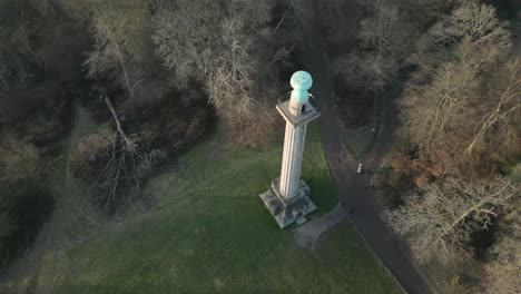 ashridge estate bridgewater monument top down aerial view orbiting autumn national trust woodland landmark