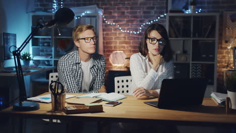 young adults studying late at night