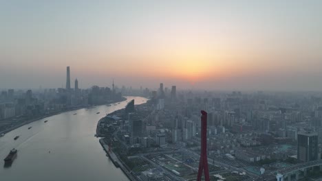 drone aerial view of sunset in huangpu river downtown shanghai china